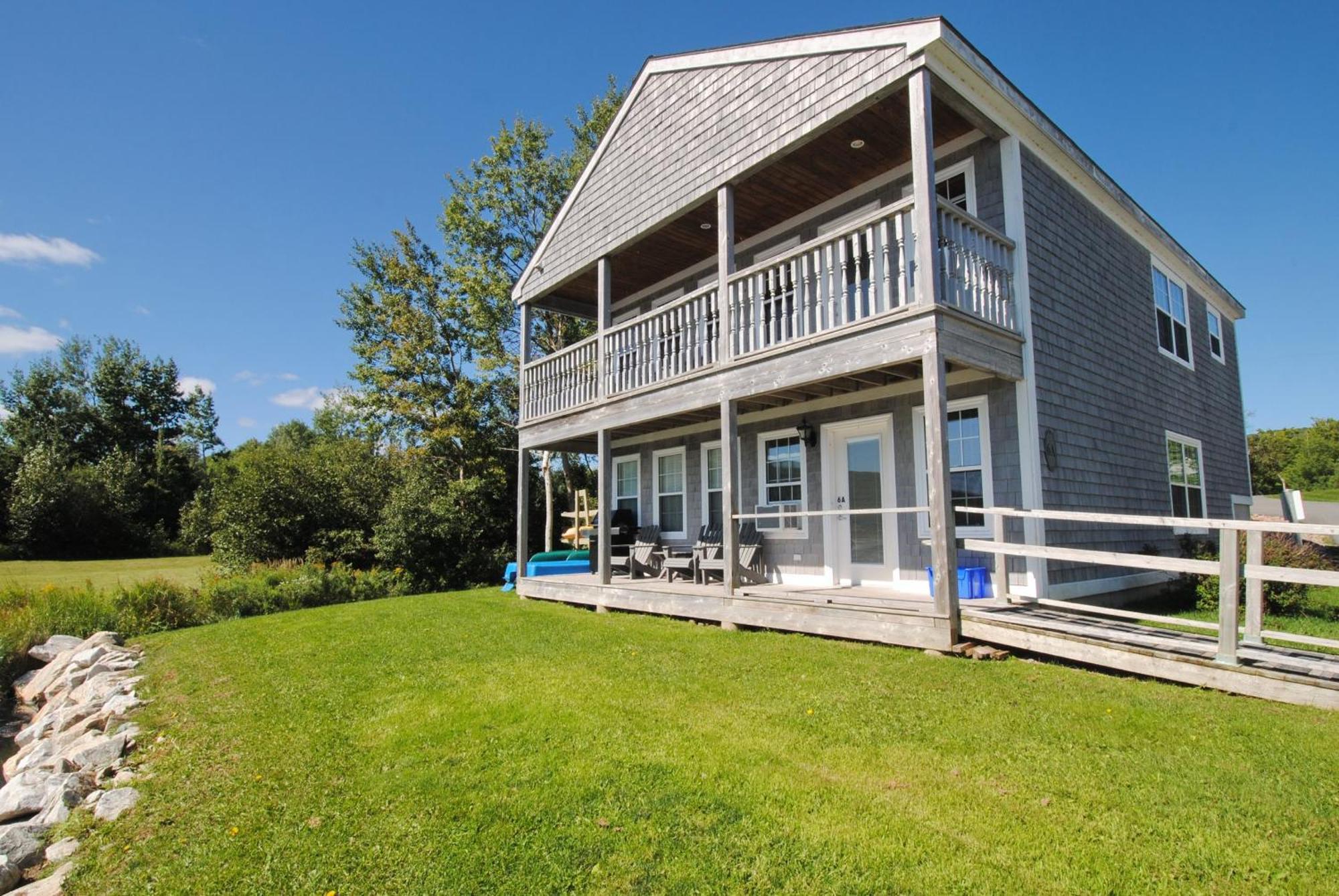 Keltic Quay Cottages & Bayfront Lodge Whycocomagh Bagian luar foto
