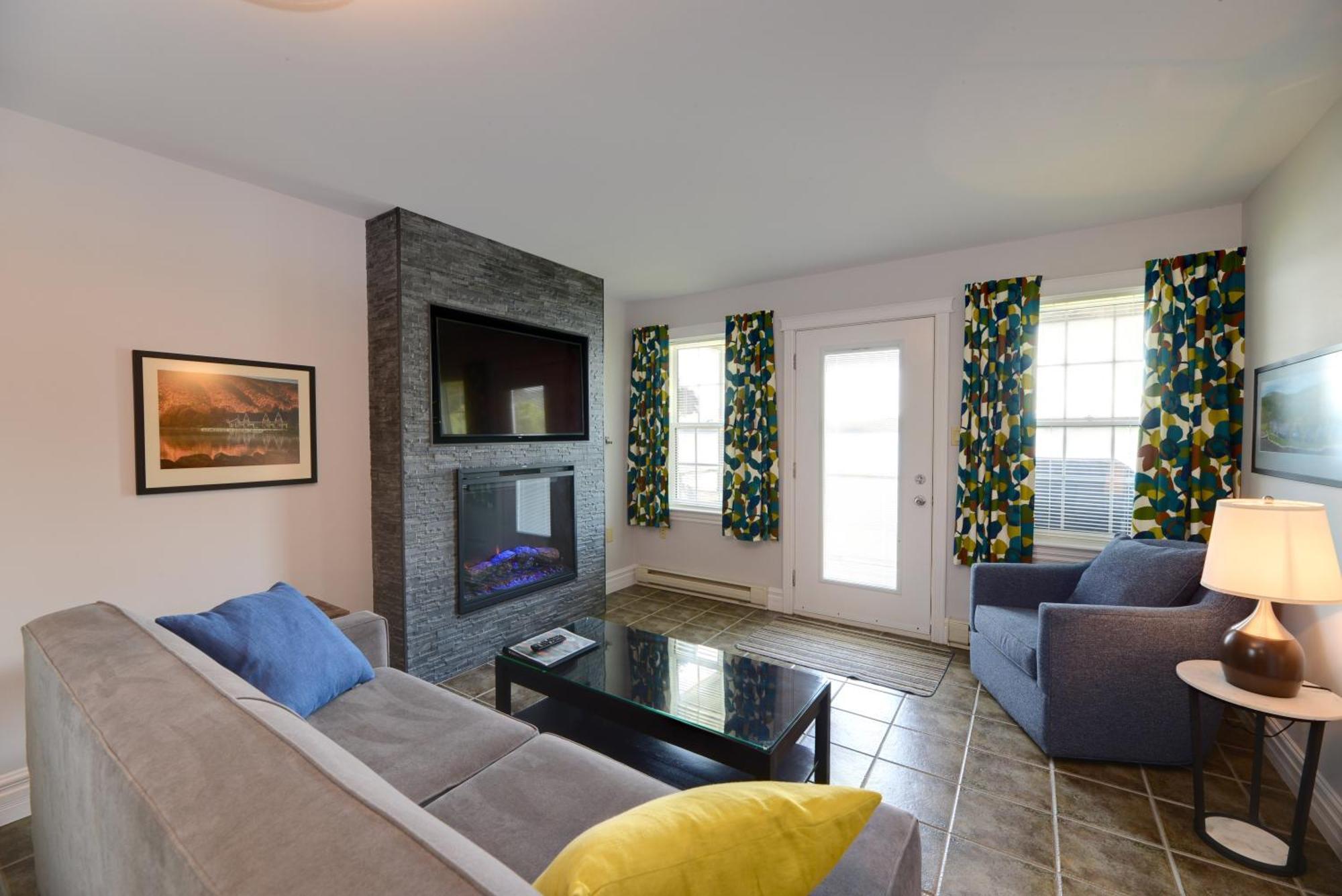Keltic Quay Cottages & Bayfront Lodge Whycocomagh Bagian luar foto