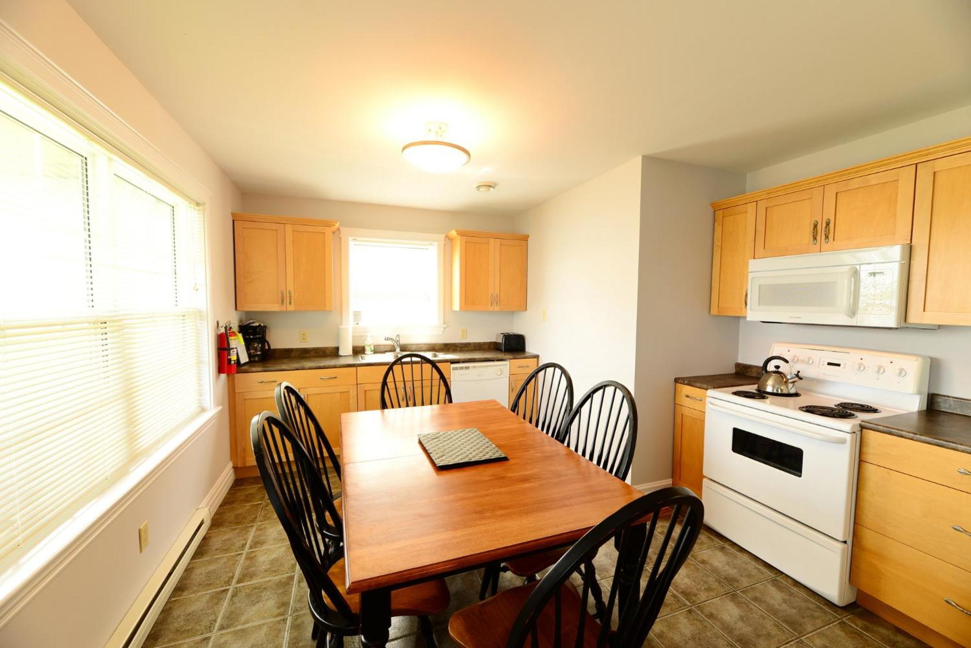 Keltic Quay Cottages & Bayfront Lodge Whycocomagh Bagian luar foto